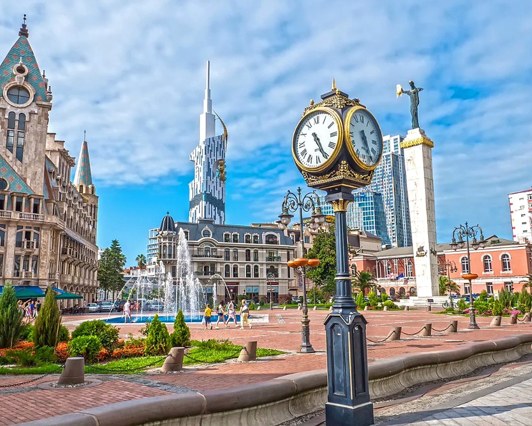 Europe Square in Batumi — Medea statue, street clock, fountain and summer light