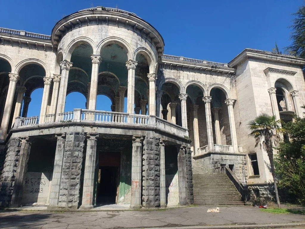 Abandoned neoclassical sanatorium with colonnade in Tskaltubo